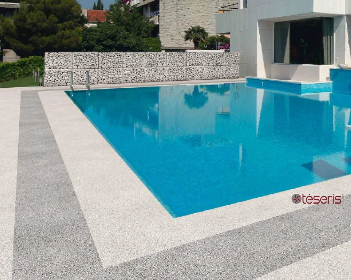 Modern pool with stone surround