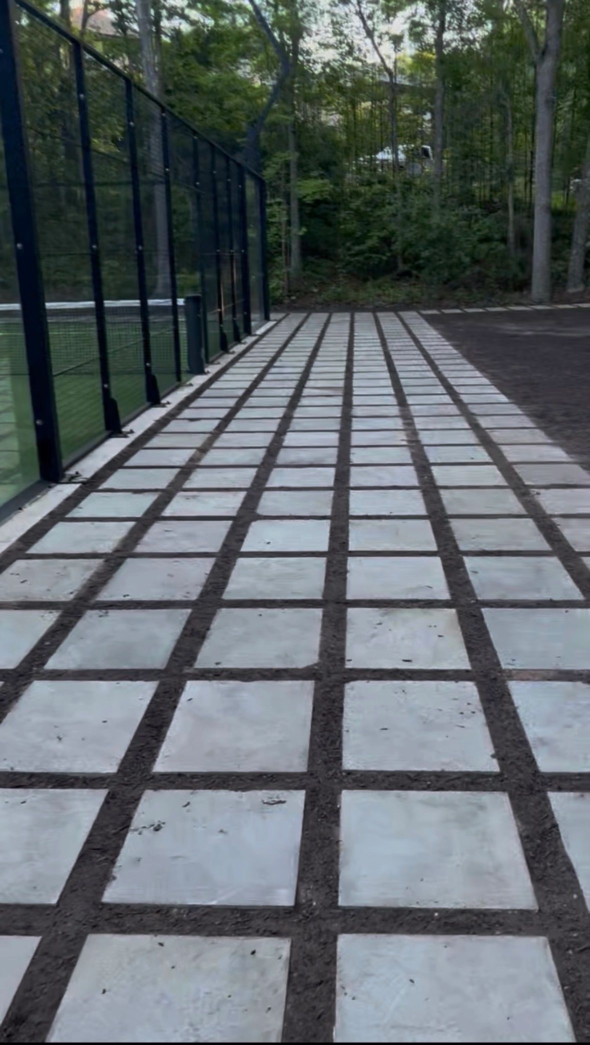 Paver deck with forest backdrop